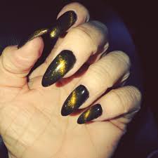 Black And Orange Cat Eye Nails Cat Eye Blackngold Almond Nail Gel Nail Cat Eye Nails Polish Cat Eye Nails Purple Nail Art