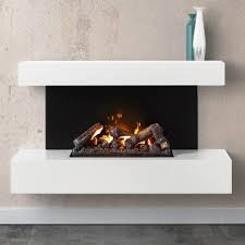 Freestanding wooden electric fireplace in white carved columns and a spacious mantel give carved columns and a spacious mantel give the centennial grand a classic style that will elevate the warmth and charm of your home. Dimplex Esme Opti Myst Electric Fireplace Suite Flames Co Uk