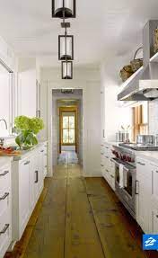 Celebrate The Layout Of Your Galley Kitchen With Pendant Lights Spaced Throughout The Len Galley Kitchen Design Galley Kitchen Renovation Galley Kitchen Layout