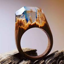 Inside Each Of These Wooden Rings Is A Beautiful Hidden World Secret Wood Rings Wooden Rings Handmade Rings