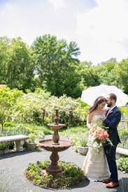Bride And Groom In The Gardens At Camrose Hill Outdoor Wedding Venue And Florist In Stillwater Mn Outdoor Wedding Venues Outdoor Wedding Wedding Venues