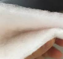 Space Saving Compacted Fabric Hot Air Through Nonwoven Fabric