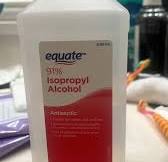 Rubbing alcohol for adhesive label removal