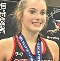 White wins wrestling title in Mill Spring