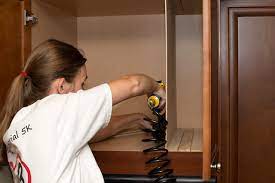 I am not exaggerating when i say that a battle took place each and every time that cupboard door opened. Kitchen Diy Adding Cookie Sheet Tray Storage Above The Oven Taking On Today