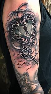 Neotraditionl roses and ribbon heart locket tattoo by guen douglas heart locket tattoo design by hannah catherine falvey Key Tattoos What S Their Meanings Plus Cool Examples