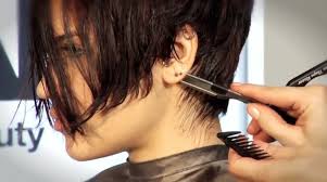 When you can't get to the salon, cut your own hair at home. How To Cut A Funky Short Haircut With A Feather Styling Razor Video