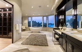 The key to a modern bathroom is a combination of clean lines, a minimalist aesthetic and bold complementary paint color. Luxurious Modern Interior Scheme Uncovered By This Brentwood Estate Mansion Bathrooms Luxury Home Decor Mansion Interior