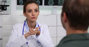 Doctor Woman Talking With A Patient Explain Medical Procedure In Hospital Room Stock Footage Patient Explain Talking Doctor Medical Women Talk Hospital Room