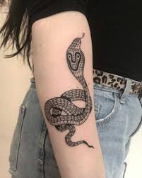 You can get a snake tattoo on your arm with a colorful geometric theme. Animal Tattoos Take A Look At The Most Beautiful Examples