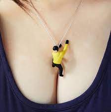 Silly Pendants Transform Women S Breasts Into Site Specific Art Installations Funny Necklace Pendant Necklace Womens Necklaces