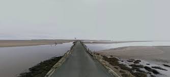 Lindisfarne Causeway The Tide Covers The Road Twice Each Day