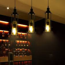 These light fixtures are perfect for someone who wants to give their space an instant boost of style. Wine Bottle Ceiling Pendant Lights Modern Glass And Iron 1 Head Hanging Pendant Lights For Bar Beautifulhalo Com