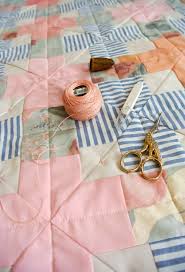 Quilting tutorials quilting designs quilting ideas necktie quilt old ties international quilt festival tie crafts ties that bind mens silk ties. How To Tie A Quilt With A Modern Twist Suzy Quilts