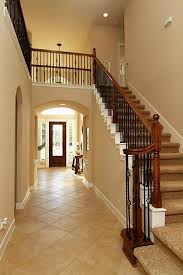 Dramatic Staircase W Wrought Iron Detail Second Floor Balcony Overlooks First Floor Www Houstonhomestaging Net Railing Design House Design Balcony Design