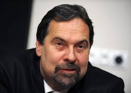 John given weak mandate as continuing chairman of Public Affairs