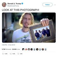 I read the title as: Trump Tweets Nickelback Look At This Photograph Meme