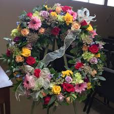 Flowers convey your sympathy and condolences and provide comfort to a grieving family. Multi Colored Funeral Wreath In Concord Ca Full Bloom