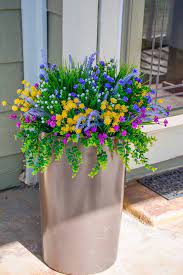 That is why we have put together a list of the 10 best artificial flowers, highlighting what each one does best. How To Make A Beautiful Outdoor Floral Arrangement Budget Equestrian Artificial Flowers Outdoors Flower Pots Outdoor Porch Flowers
