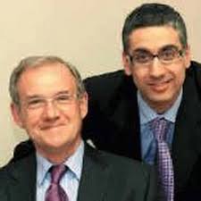 Former boss chairs rival