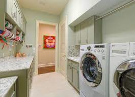 Be sure to scroll all the way through the post to see both my laundry room and some lovely laundry and craft room inspiration photos at the end. Laundry Craft Room Remodel Beach Style Laundry Room Miami By Cutting Edge Construction Woodworks Inc Houzz
