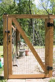 How to build a fence overview: Expanding Our Backyard Garden Backyard Fences Diy Garden Fence Backyard Garden Diy