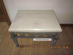 These rustic coffee tables for sale are available in a range of finishes and materials including, glass and copper that easily fit with any contemporary seating. Wrought Iron And Marble Stone Coffee Table Stone Coffee Table Coffee Table Table