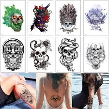 Here, snake tattoos are juxtaposed with real snakes that firmly blur the lines between nature and art. Flower Arm Tattoo Sticker White Black Fake Waterproof Design Cool Skull Snake Decal For Woman Man Body Sleeve Back Leg Art Temporary Tattoos From Homimly 0 89 Dhgate Com