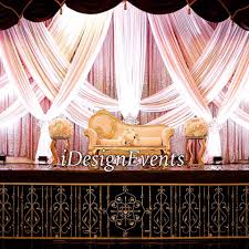 Rose Gold Sequin Backdrop Stage Design With Swagging In Ivory For Maharani Wedding Decor Available Id Rental Decorating Chair Cover Rentals Linen Chair Covers
