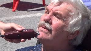 Dave Gauthier of Westport Ace Hardware takes it all off for Make-A-Wish  chidren's charity.