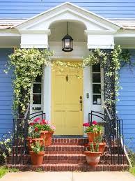 7 Front Door Colors What They Say About You The Home Depot Community Yellow Front Doors Light Blue Houses Exterior House Colors