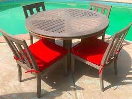 Pressure washing and power washing outdoor patio furniture will remove both the silver patina and natural oil of the wood, so it is recommended to add in teak or tung oil in order to replace. Constance Teak 5 Piece Dining Set With Cushions Iksun Teak Patio Furniture Sale