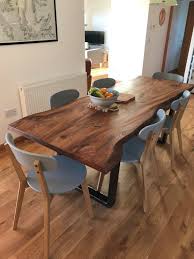 If There Is One Certain Item That Illustrates This Pattern It Is Definitely The Live Edg Slab Dining Tables Wood Dining Room Table Wooden Dining Table Designs