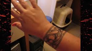 25 lively tribal band tattoos. Tribal Tattoos For Men On Wrist Youtube