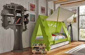 Full over full bunk beds with twin size trundle. Trundle Bed For Children Creatively Closes Into Private Tent With Light