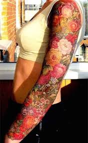 An ethereal black and gray flower themed piece tattoo hugging the lower arm. Full Sleeve Flowers Tattoo Pictures Tattoo Pictures