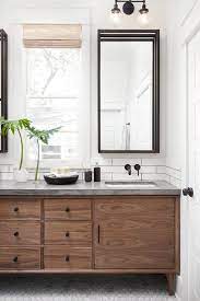 Bertch's newest bath vanity, magnolia, features applied moulding bordering a flat center panel. 20 Dreamy Fixer Upper Bathrooms Best Joanna Gaines Bathroom Designs