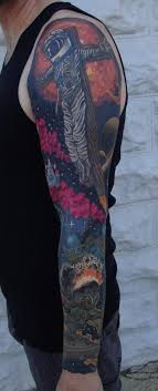 Got it last summer, thought this sub may appreciate it. Astronaut Jesus Sleeve By Larry Brogan Tattoos