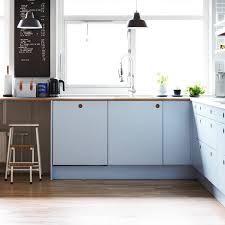 An accordion sconce provides task lighting and an unusual focal point. Pastel Kitchen Designs To Die For Apartment Therapy