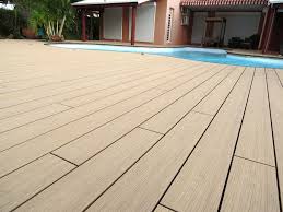 Ocewood Plage De Piscine Tropicale En Bois Composite Optima Plus Moka Credits Ocewood Nouvelle Caledonie Piscine Plage Piscine Tropicale Piscine
