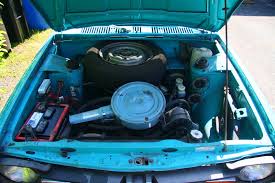 Image result for Herald Yellow 1976 Subaru