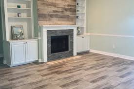 Laminate flooring on fireplace wall. Unique Wall Ideas With Flooring Bestlaminate Photo Gallery