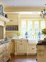 Minacciolo country kitchens with italian style. The Yellow And Blue Combination Is Lovely Yellow Kitchen Cabinets Kitchen Cabinet Colors French Country Kitchens