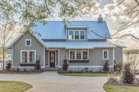 The Massive Great Room Of This Exclusive Farmhouse House Plan Has A Wall Of Glass Along House Plans Farmhouse Farmhouse House Architectural Design House Plans