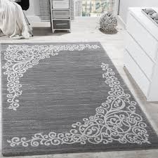 Doch dort gibt es häufig nur eine eingeschränkte produktauswahl. Designer Teppich Mit Floral Muster Glitzergarn Grau Weiss Anthrazit Meliert Kaufen Bei Diva Teppich Center