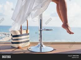 Beach, beach chair, feet, female, barefoot, girl, lady, legs, leisure, outdoors, people. Girl Beach Bag Sitting Image Photo Free Trial Bigstock