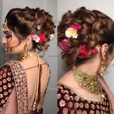 Wedding Hair Inspiration Accessorise Your Hair With Small Flowers On Your Wedd Indian Bridal Hairstyles Indian Wedding Hairstyles Bridal Hair Buns