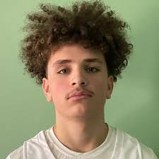 Dvell Garrison Jr.'s Charles J. Colgan High School Bio