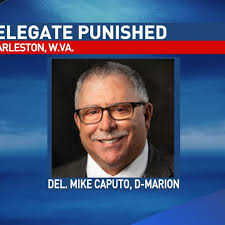 Delegate who kicked open door, injured doorkeeper, responds to punishment