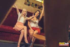 Adara Love and Lovita Fate bounce on the male stripper's pole at the ladies  club